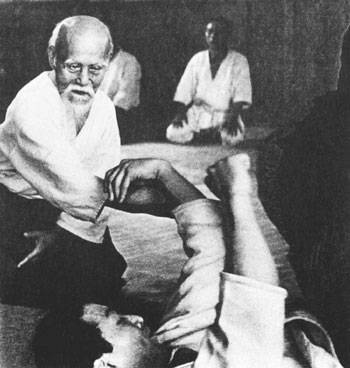 Morihei Ueshiba O-Sensei throws Shizuo Imaizumi at Aikikai Hombu Dojo c. 1965