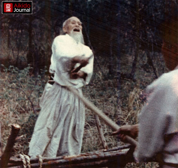Morihei Ueshiba and Morihiro Saito practicing the Aiki Ken in the fields of Iwama c. 1957