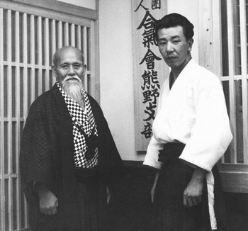 Morihei Ueshiba with Michio Hikitsuchi c. 1953